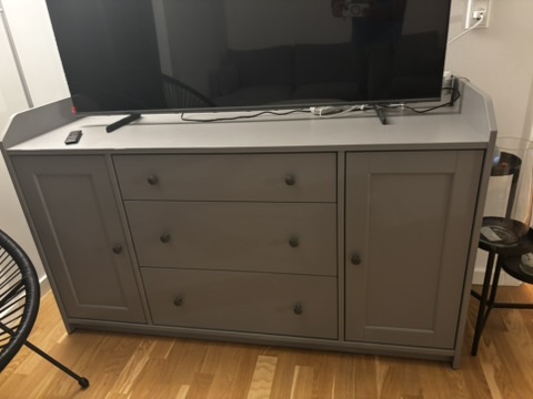 Grey TV cabinet with drawers
